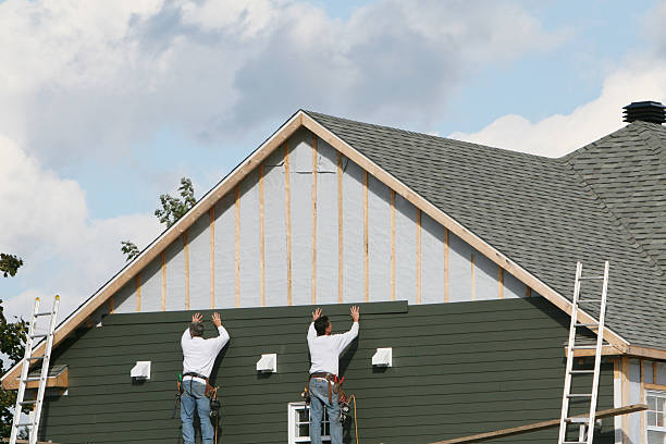 Professional Siding technician working in Candor, NC
